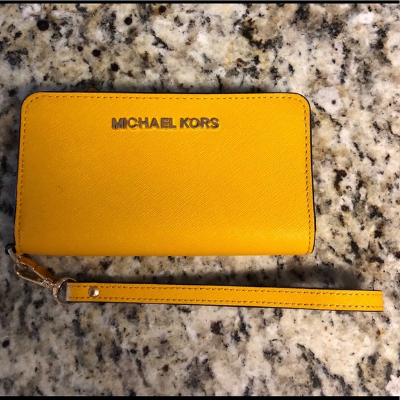 Michael Kors Handbags - Michael Kors wristlet mustard-yellow